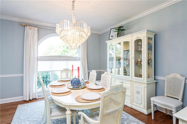 585 Agnes St, Hempfield Twp Wml, PA 15601 - dining space featuring a chandelier, dark wood finished floors, ornamental molding, and baseboards