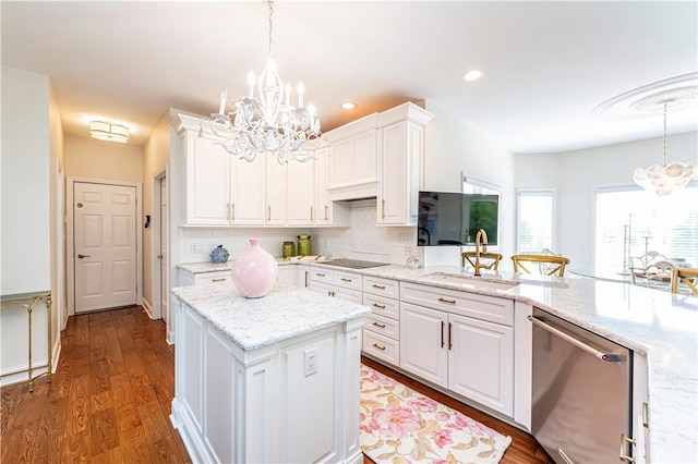 585 Agnes St, Hempfield Twp Wml, PA 15601 - kitchen with a chandelier, stainless steel dishwasher, a sink, white cabinets, and recessed lighting