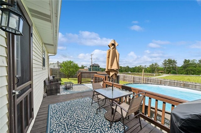 136 Isabella St, Derry Twp, PA 15717 - wooden terrace featuring a fenced backyard, outdoor dining space, and area for grilling