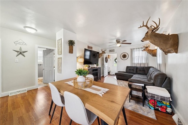 136 Isabella St, Derry Twp, PA 15717 - dining area with wood finished floors, ceiling fan, and baseboards