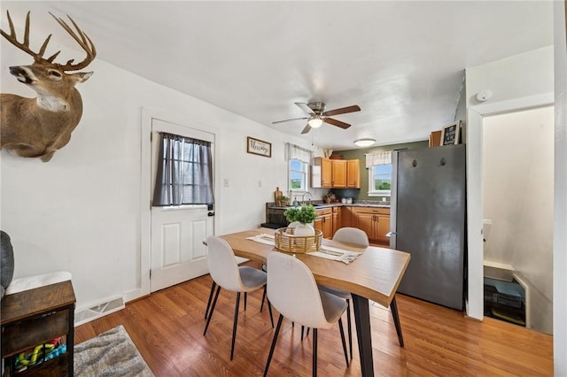 136 Isabella St, Derry Twp, PA 15717 - dining space with ceiling fan and light wood finished floors