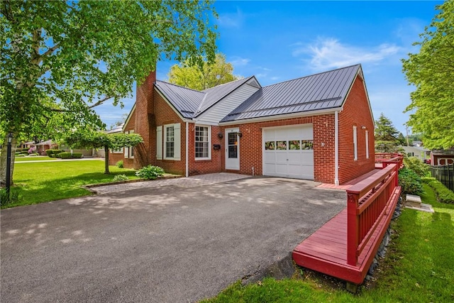 865 W Sanner St, Somerset Boro, PA 15501 - view of front facade featuring an attached garage, a standing seam roof, brick siding, a chimney, and metal roof