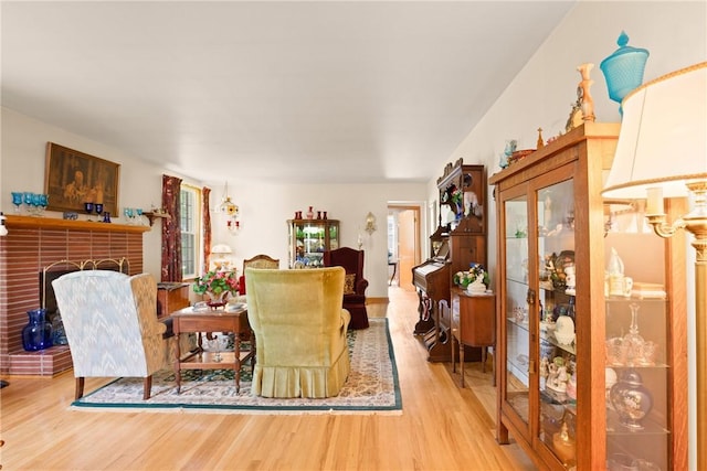 865 W Sanner St, Somerset Boro, PA 15501 - dining space with wood finished floors and a brick fireplace