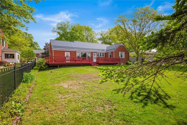 865 W Sanner St, Somerset Boro, PA 15501 - rear view of property featuring a wooden deck and metal roof