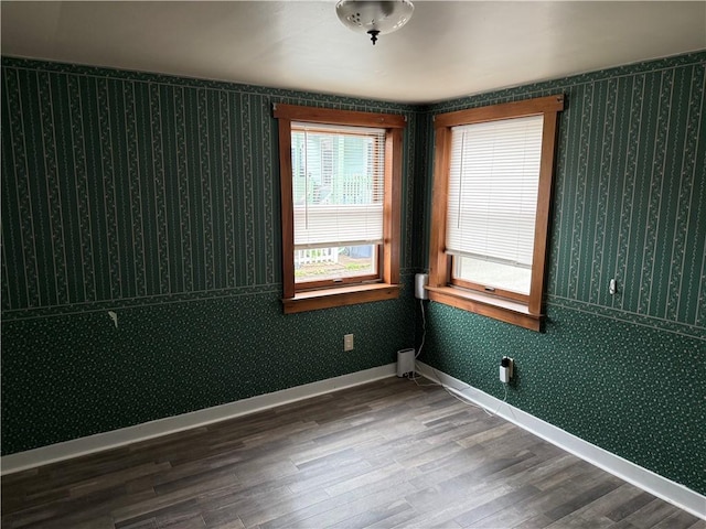 1335R 4th Ave, Ford City Boro, PA 16226 - empty room featuring wood finished floors, baseboards, and wallpapered walls