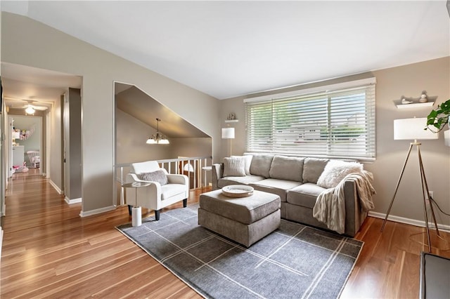 15 Fawnridge Dr, Robinson Twp Nwa, PA 15136 - living room with wood finished floors, baseboards, and a chandelier