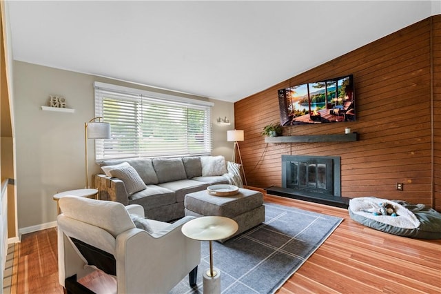 15 Fawnridge Dr, Robinson Twp Nwa, PA 15136 - living area with wood walls, wood finished floors, a fireplace, and baseboards