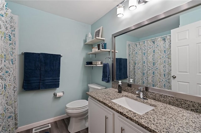 15 Fawnridge Dr, Robinson Twp Nwa, PA 15136 - bathroom featuring wood finished floors, toilet, baseboards, vanity, and a shower with curtain