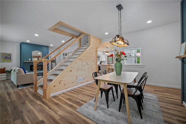103 Depot St, Midway, PA 15060 - dining space featuring stairs, recessed lighting, wood finished floors, and baseboards