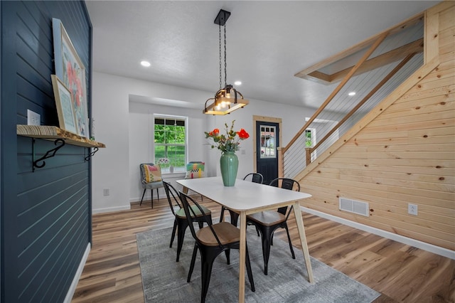 103 Depot St, Midway, PA 15060 - dining room with recessed lighting, baseboards, wood finished floors, and wooden walls