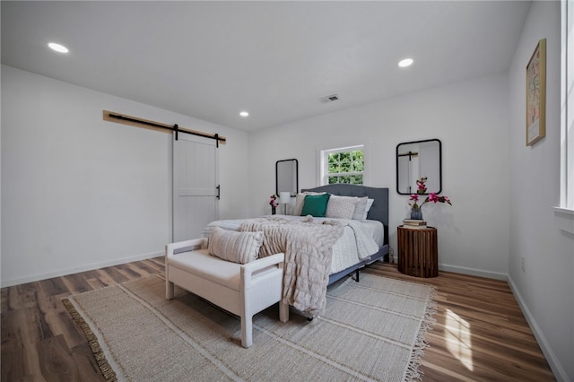 103 Depot St, Midway, PA 15060 - bedroom featuring a barn door, wood finished floors, baseboards, and recessed lighting