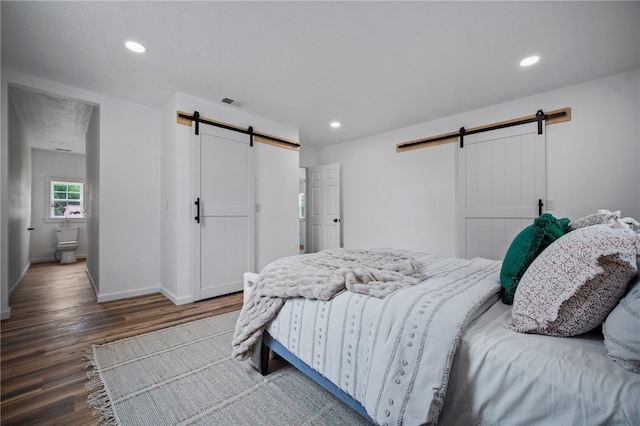 103 Depot St, Midway, PA 15060 - bedroom featuring a barn door, wood finished floors, recessed lighting, and baseboards