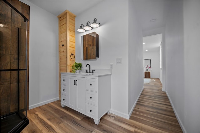 103 Depot St, Midway, PA 15060 - bathroom featuring wood finished floors, a shower stall, vanity, baseboards, and recessed lighting
