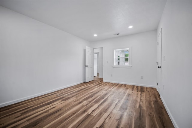 103 Depot St, Midway, PA 15060 - spare room featuring wood finished floors, baseboards, and recessed lighting