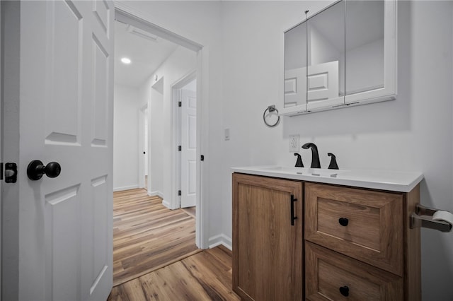 103 Depot St, Midway, PA 15060 - bathroom featuring wood finished floors, vanity, and baseboards
