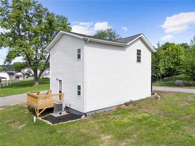103 Depot St, Midway, PA 15060 - view of property exterior featuring a deck, a yard, and central AC unit
