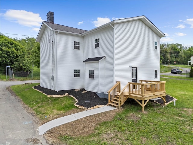 103 Depot St, Midway, PA 15060 - rear view of property with a chimney, a wooden deck, and a lawn