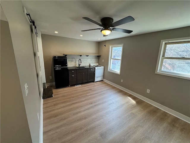 514 Knoll St, Central North Side, PA 15212 - kitchen with electric stove, refrigerator, a sink, a barn door, and light wood-type flooring