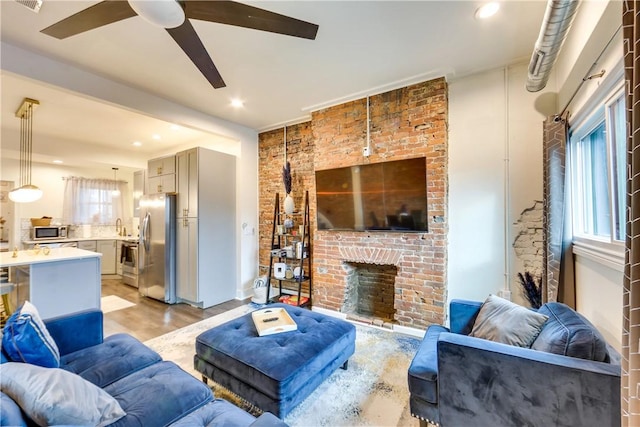 514 Knoll St, Central North Side, PA 15212 - living area with ceiling fan, light wood-style flooring, recessed lighting, and a fireplace