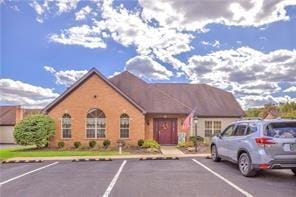 22 Ashford Dr, Cranberry Twp, PA 16066 - view of building exterior featuring uncovered parking