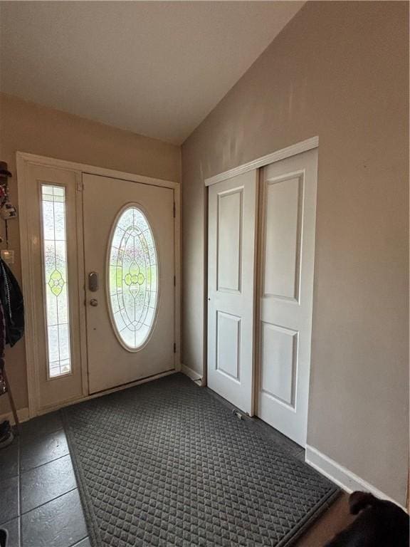 518 Equestrian Way, Mount Pleasant Twp Wml, PA 15666 - foyer featuring lofted ceiling and baseboards