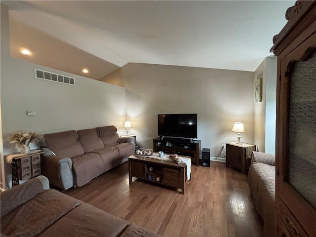 518 Equestrian Way, Mount Pleasant Twp Wml, PA 15666 - living area with wood finished floors and vaulted ceiling