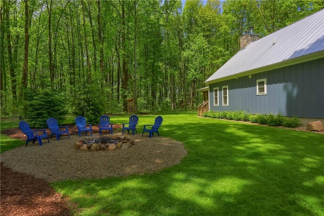 500 Shady Ln, Slippery Rock Twp Law, PA 16117 - view of green lawn with an outdoor fire pit and a view of trees