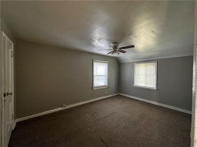 2310 Delaware Ave, New Castle/2Nd, PA 16105 - unfurnished room featuring baseboards, ceiling fan, and dark carpet