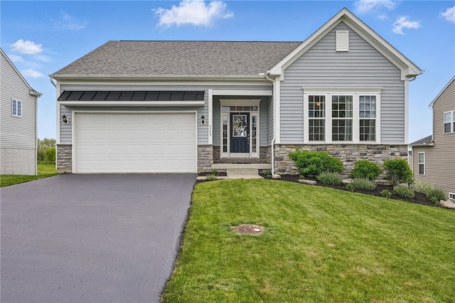3005 Sir Charles Dr, Cecil, PA 15057 - view of front of home with stone siding, asphalt driveway, a front yard, roof with shingles, and an attached garage