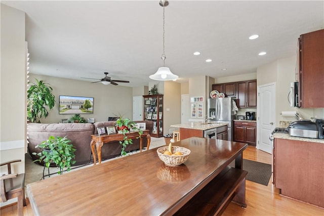 2282 Flint Dr, South Strabane, PA 15301 - dining room with light wood-style flooring, ceiling fan, and recessed lighting