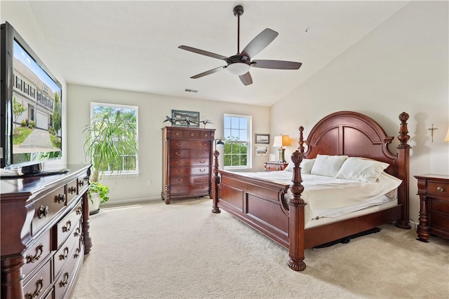 2282 Flint Dr, South Strabane, PA 15301 - bedroom featuring light colored carpet, multiple windows, lofted ceiling, and a ceiling fan