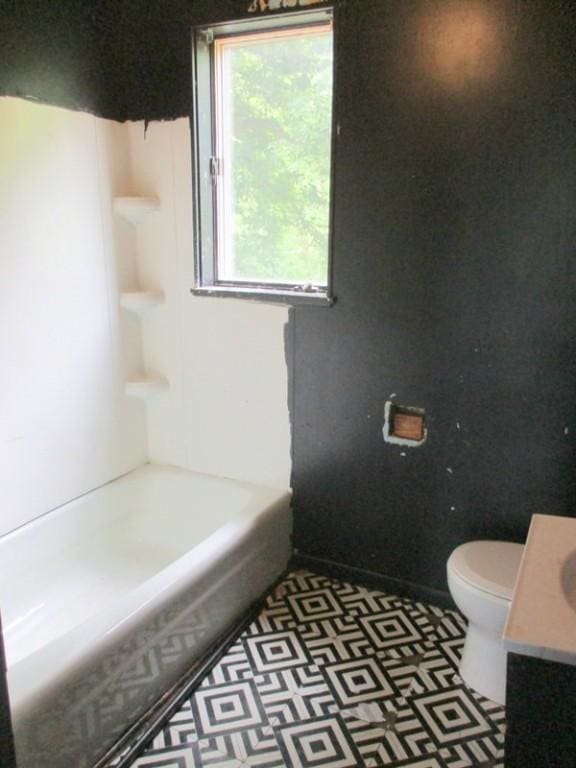 1528 Beaver Rd, Ambridge, PA 15003 - bathroom featuring toilet, a tub to relax in, vanity, a shower, and tile patterned floors