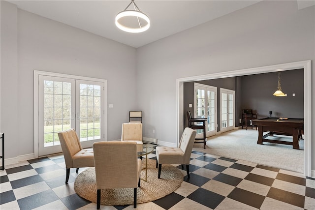 506 Villa Dr, Peters Twp, PA 15367 - carpeted dining room featuring healthy amount of natural light, a towering ceiling, baseboards, and french doors