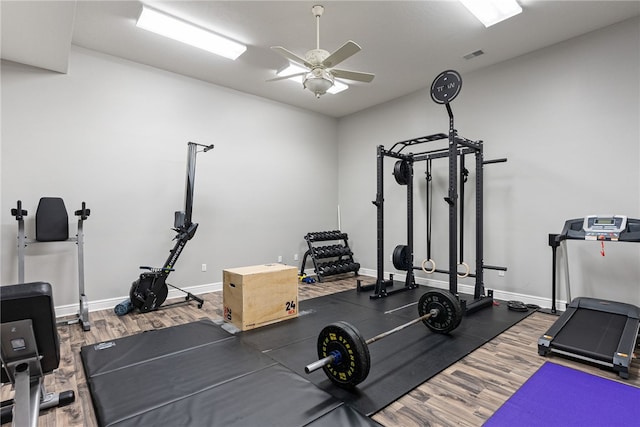506 Villa Dr, Peters Twp, PA 15367 - exercise room with wood finished floors, baseboards, and a ceiling fan