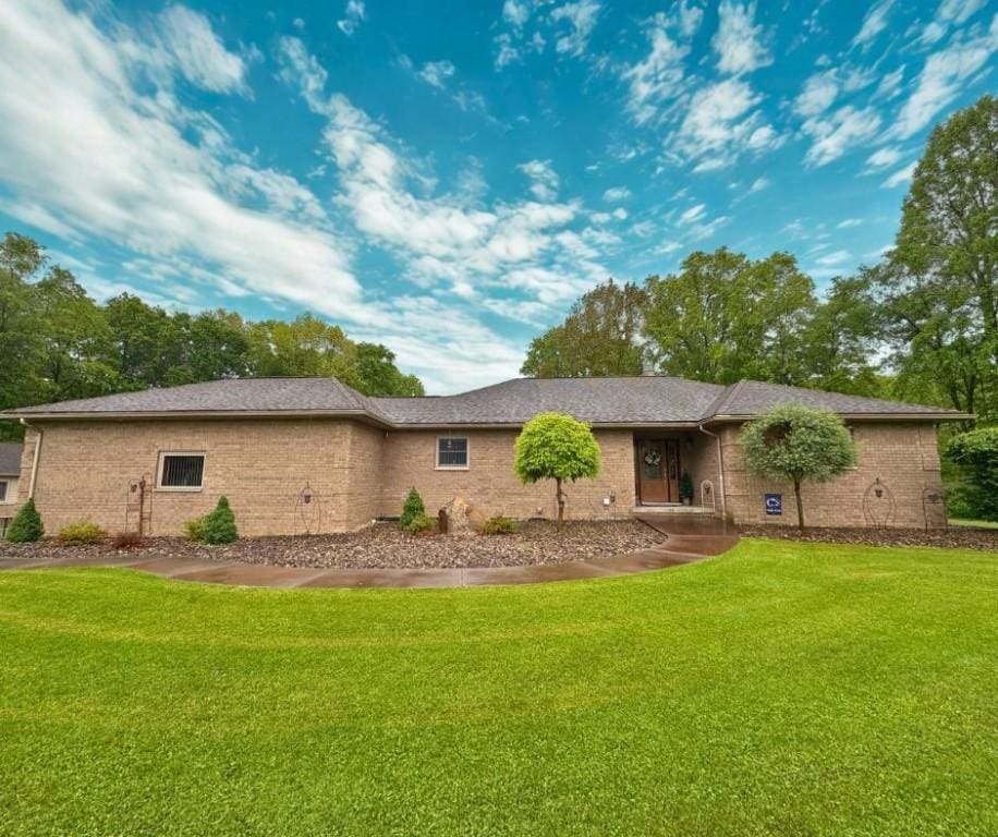 192 Crill Rd, Findley Twp, PA 16137 - view of front of house featuring a front lawn and brick siding