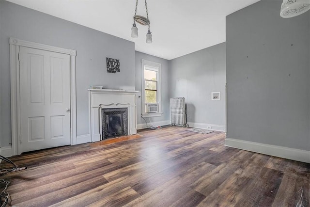 5 Rio Vista St, West Newton, PA 15089 - unfurnished living room featuring wood finished floors, a fireplace with flush hearth, baseboards, and cooling unit