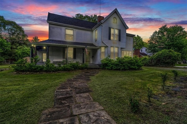5 Rio Vista St, West Newton, PA 15089 - view of front of home with covered porch, a lawn, and a chimney