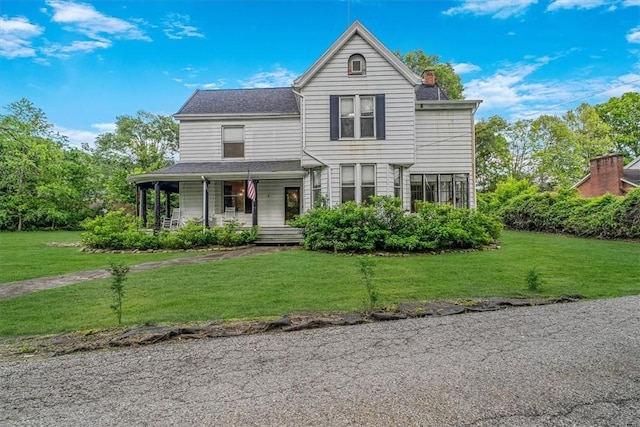 5 Rio Vista St, West Newton, PA 15089 - view of front of property with a porch, a chimney, a front lawn, and a shingled roof