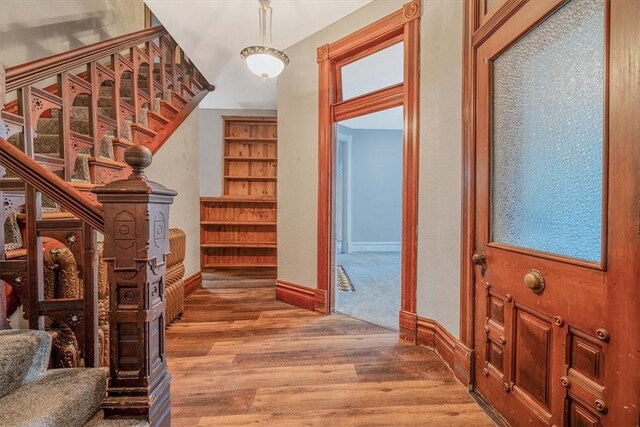 5 Rio Vista St, West Newton, PA 15089 - hallway featuring wood finished floors, stairs, and baseboards