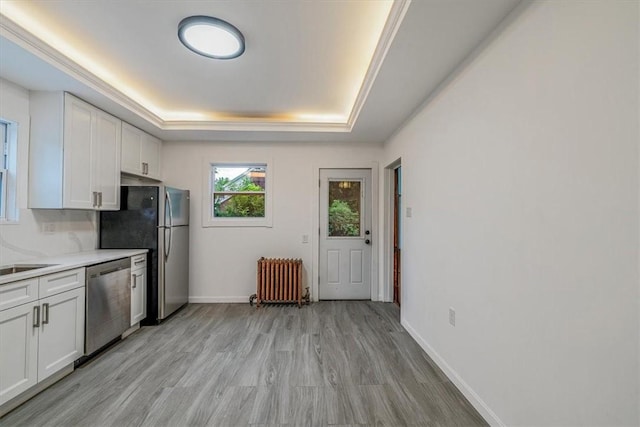 5 Rio Vista St, West Newton, PA 15089 - kitchen with radiator, appliances with stainless steel finishes, a raised ceiling, light countertops, and white cabinets