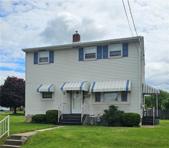 2318 Cottage Ave, Natrona Hts/Harrison Twp, PA 15065 - view of property with a front lawn and a chimney