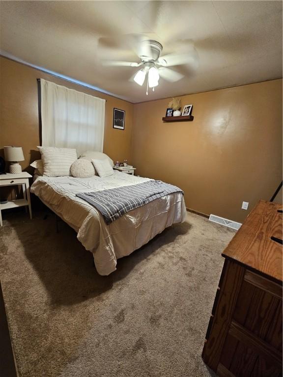 2318 Cottage Ave, Natrona Hts/Harrison Twp, PA 15065 - carpeted bedroom with a ceiling fan and baseboards