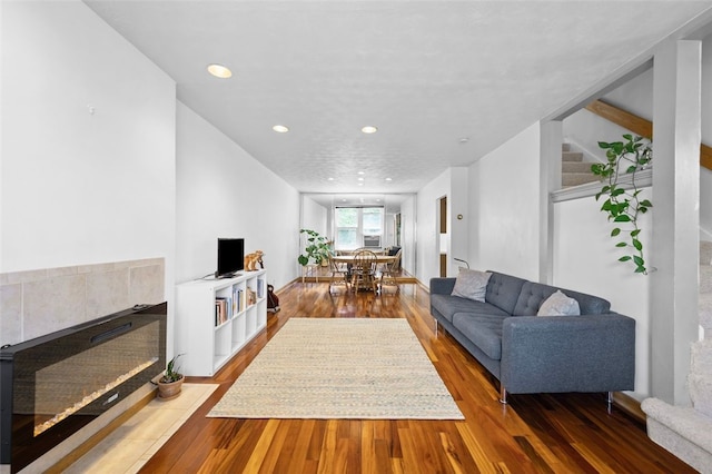 3983 Beechwood Blvd, Squirrel Hill, PA 15217 - living room with hardwood / wood-style floors, recessed lighting, and a tile fireplace