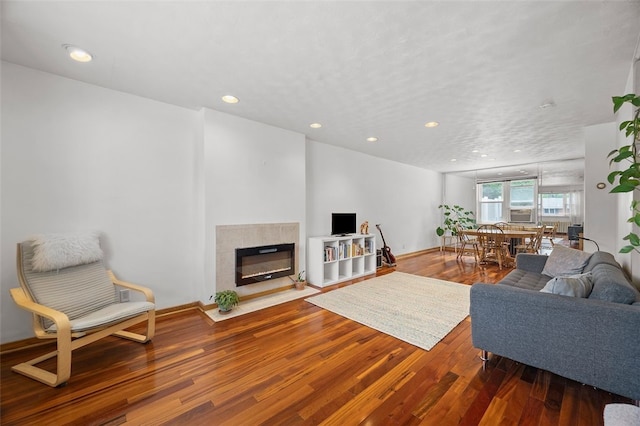 3983 Beechwood Blvd, Squirrel Hill, PA 15217 - living area with wood finished floors, recessed lighting, a fireplace with flush hearth, and baseboards