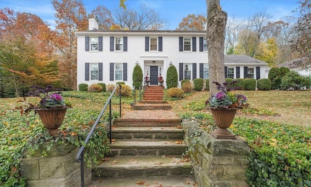 22 Woodland Rd, Edgeworth, PA 15143 - colonial home featuring a chimney