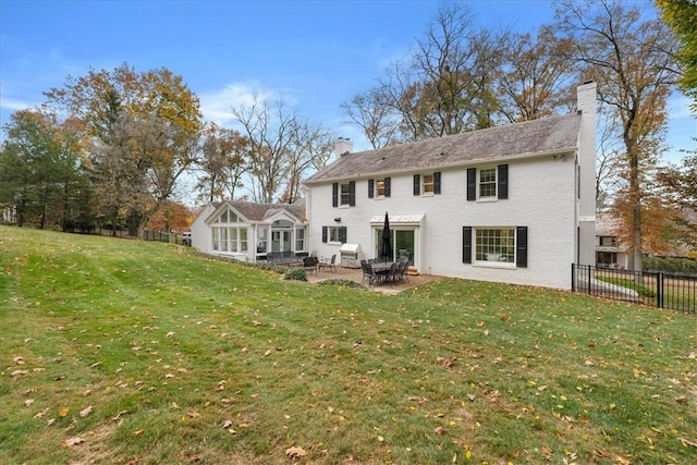 22 Woodland Rd, Edgeworth, PA 15143 - back of property featuring a chimney and a patio