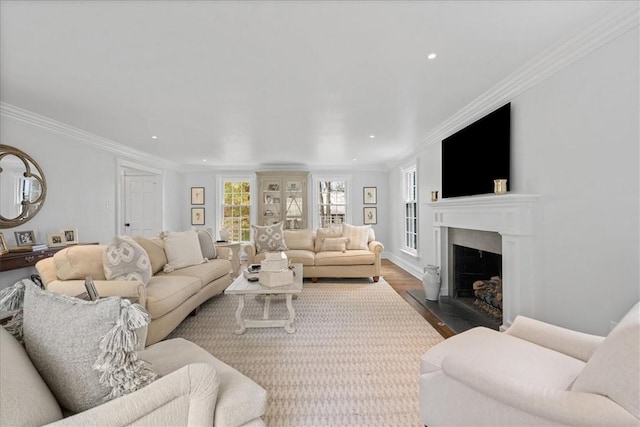 22 Woodland Rd, Edgeworth, PA 15143 - living area with a fireplace with flush hearth, dark wood-type flooring, crown molding, and recessed lighting