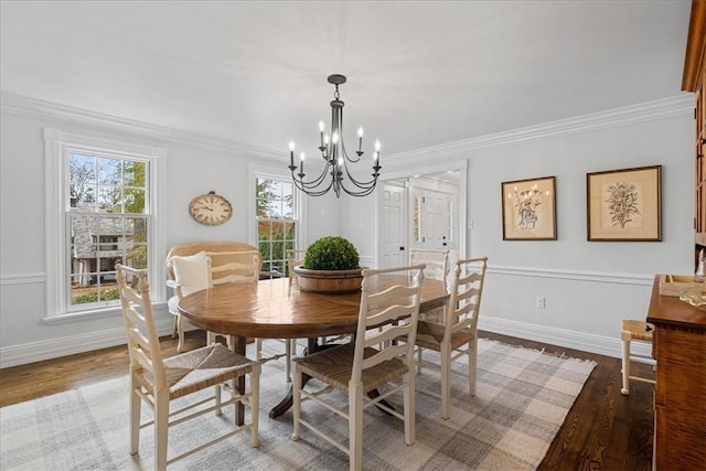 22 Woodland Rd, Edgeworth, PA 15143 - dining room featuring a chandelier, light wood-style flooring, baseboards, and ornamental molding