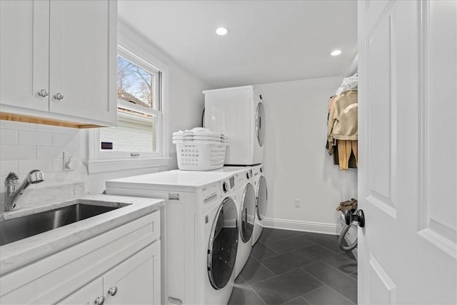 22 Woodland Rd, Edgeworth, PA 15143 - washroom with cabinet space, baseboards, dark tile patterned flooring, and recessed lighting
