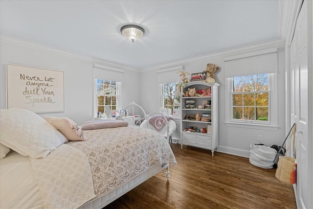 22 Woodland Rd, Edgeworth, PA 15143 - bedroom featuring crown molding, dark wood finished floors, and baseboards